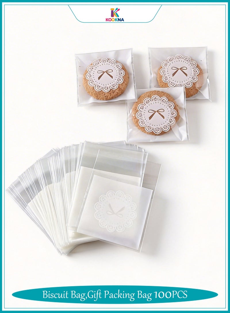 كوكنا أكياس تغليف حلويات، ذاتية اللصق بنمط فيونكة بيضاء، أكياس هدايا شفافة لعيد مبارك، أكياس صغيرة للبسكويت والشوكولاتة، 7x10 سم، 100 قطعة - Image 1